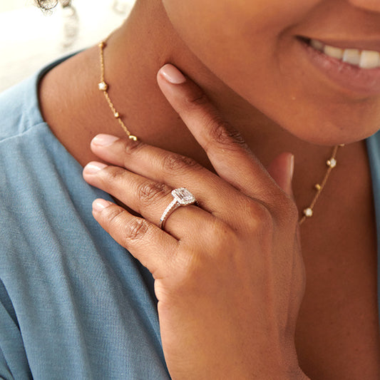 emerald cut halo engagement rings