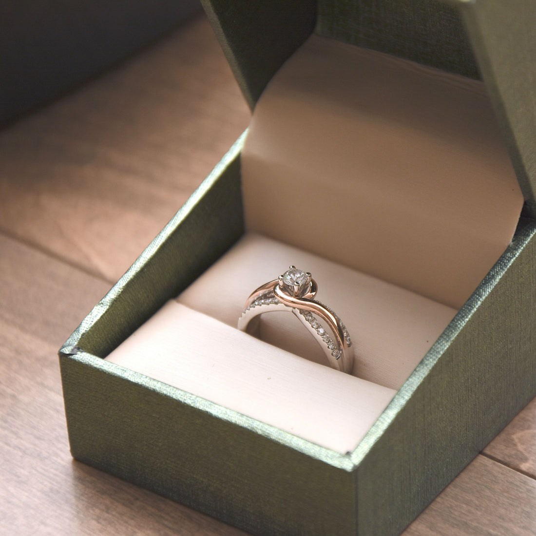 two tone engagement ring in a box